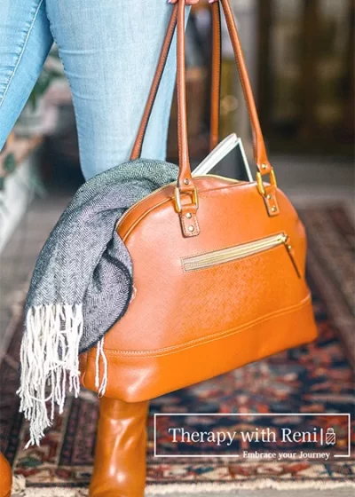 https://therapywithreni.com/wp-content/uploads/2025/01/suitcase-front-with-logo-011-400x560.webp