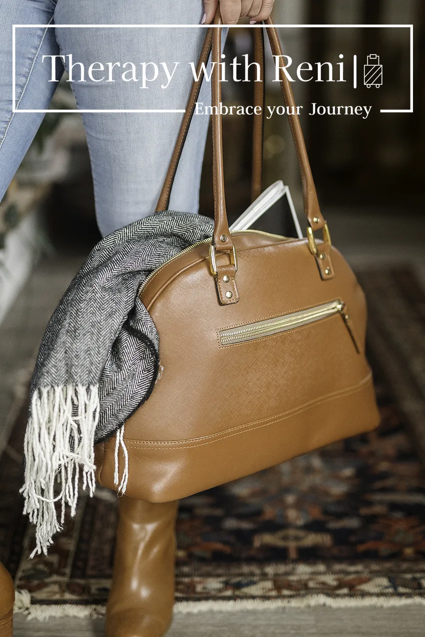 https://therapywithreni.com/wp-content/uploads/2025/01/suitcase-front-with-logo-0111.webp
